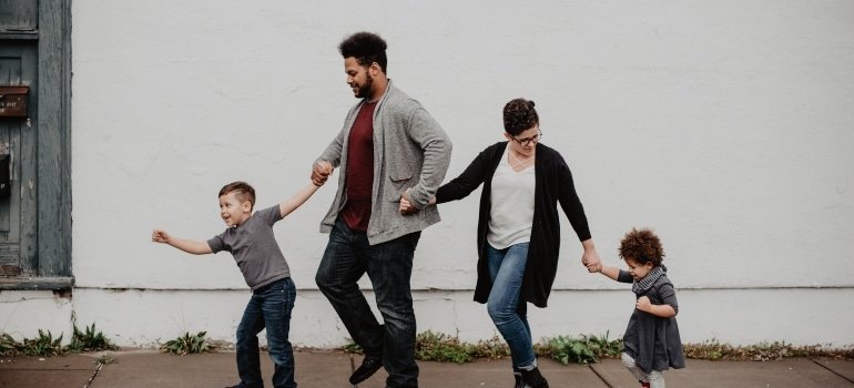 family walking down the street